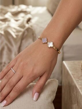 60. Atteri brass clover bracelet